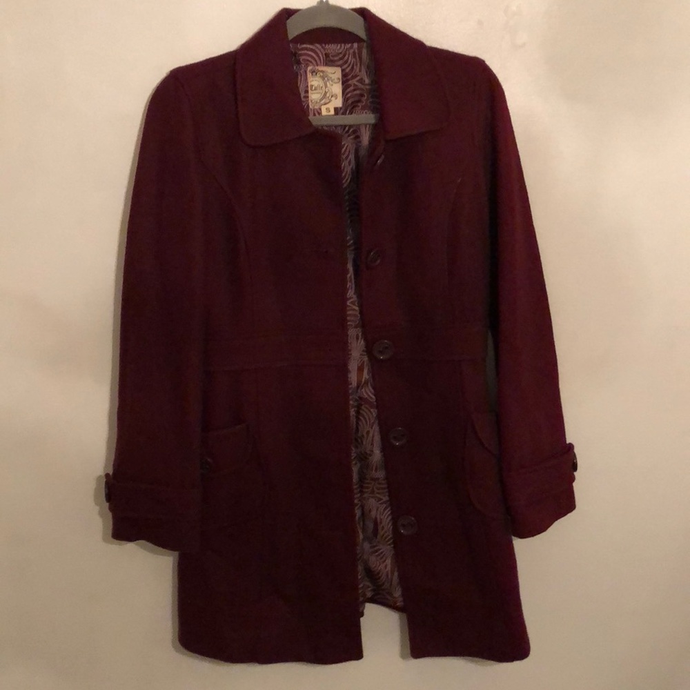 Thick burgundy coat.